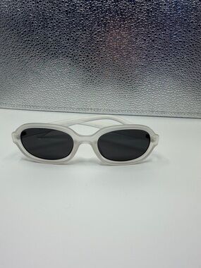 White Oval Sunglasses with Dark Lenses